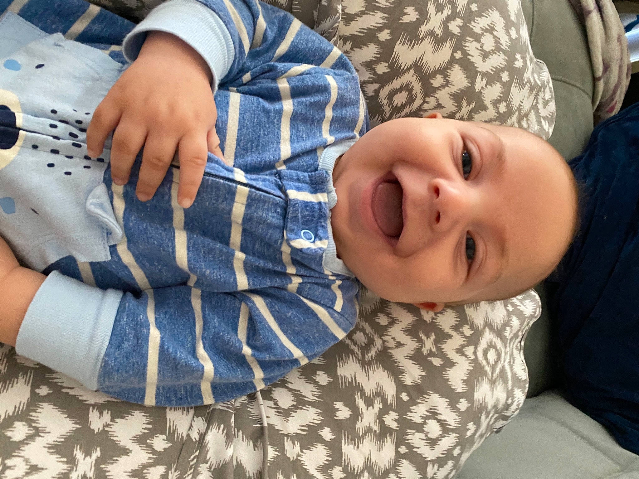 Joaquin joined the competition — help win amazing prizes! baby, baby_laughing, baby_toddler_clothing, bracelet, button, comfort, cuff, human, laugh, nail, pattern, person, plaid, polka_dot, tooth, wrist