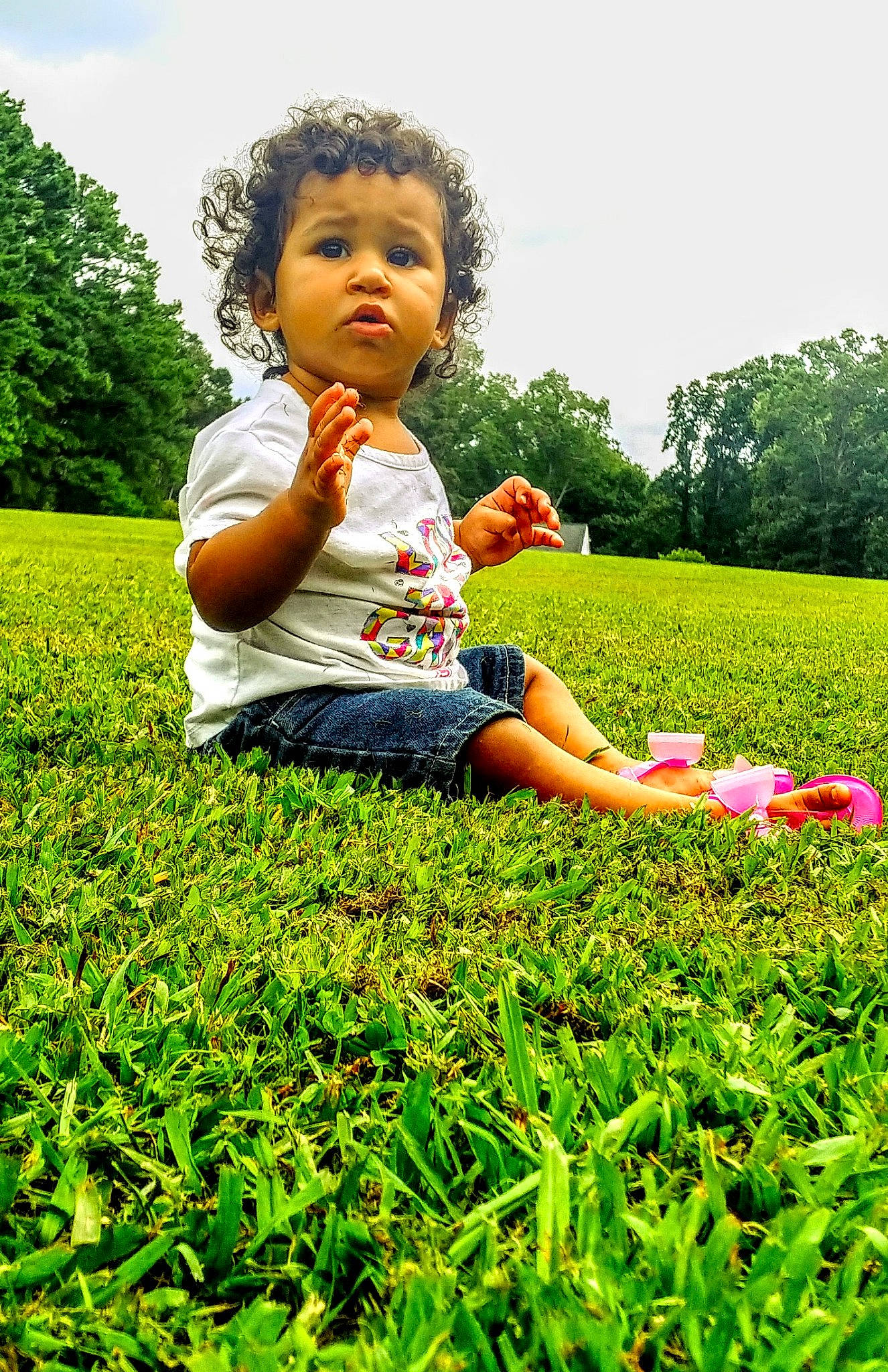 Carmella joined the competition — help win amazing prizes! child, finger, fun, grass, grass_family, grassland, green, happy, lawn, leaf, leisure, meadow, people_in_nature, person, plant, play, sitting, skin, spring, summer
