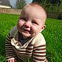 baby, child, smile, grass, outdoor, crawling, sweater, striped_clothing, greenery, nature, daylight, happy, person, face, head, cute, young_child, baby_clothes, background, sky