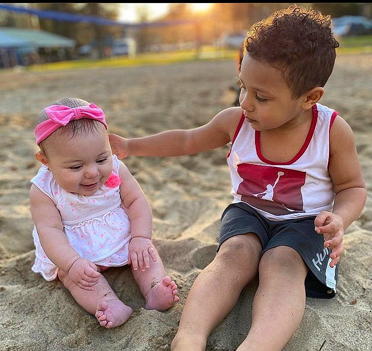 Jamari joined the competition — help win amazing prizes! baby, baby_toddler_clothing, child, fun, joy, person, pink, play, playing_with_kids, sibling, sitting, smile, summer, toddler, vacation