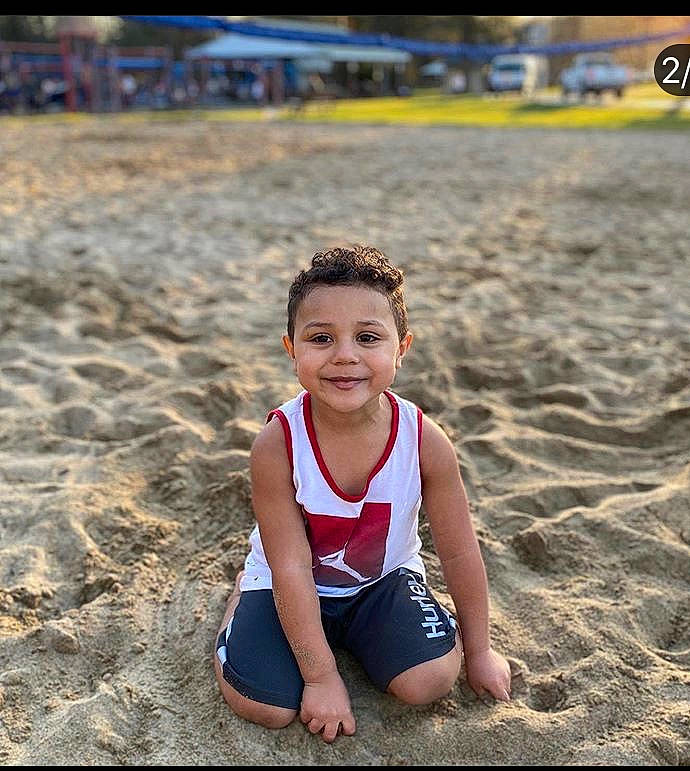 Jamari is registered to the contest to win money with this photo: beach, beauty, child, child_model, eye, fun, happy, joy, leisure, person, photograph, photography, play, portrait_photography, sand, sitting, smile, soil, summer, toddler