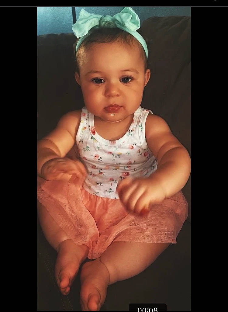 Alaysia is registered to the contest to win money with this photo: arm, baby, beauty, cheek, child, chin, eye, face, facial_expression, forehead, hand, head, human, lip, mouth, muscle, person, sitting, skin, smile