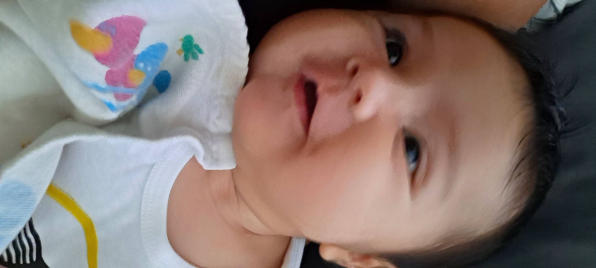 Zachary is registered to the contest to win money with this photo: baby, cheek, chin, eye, eyebrow, eyelash, facial_expression, forehead, gesture, happy, head, human, iris, lip, mammal, mouth, neck, nose, person, skin