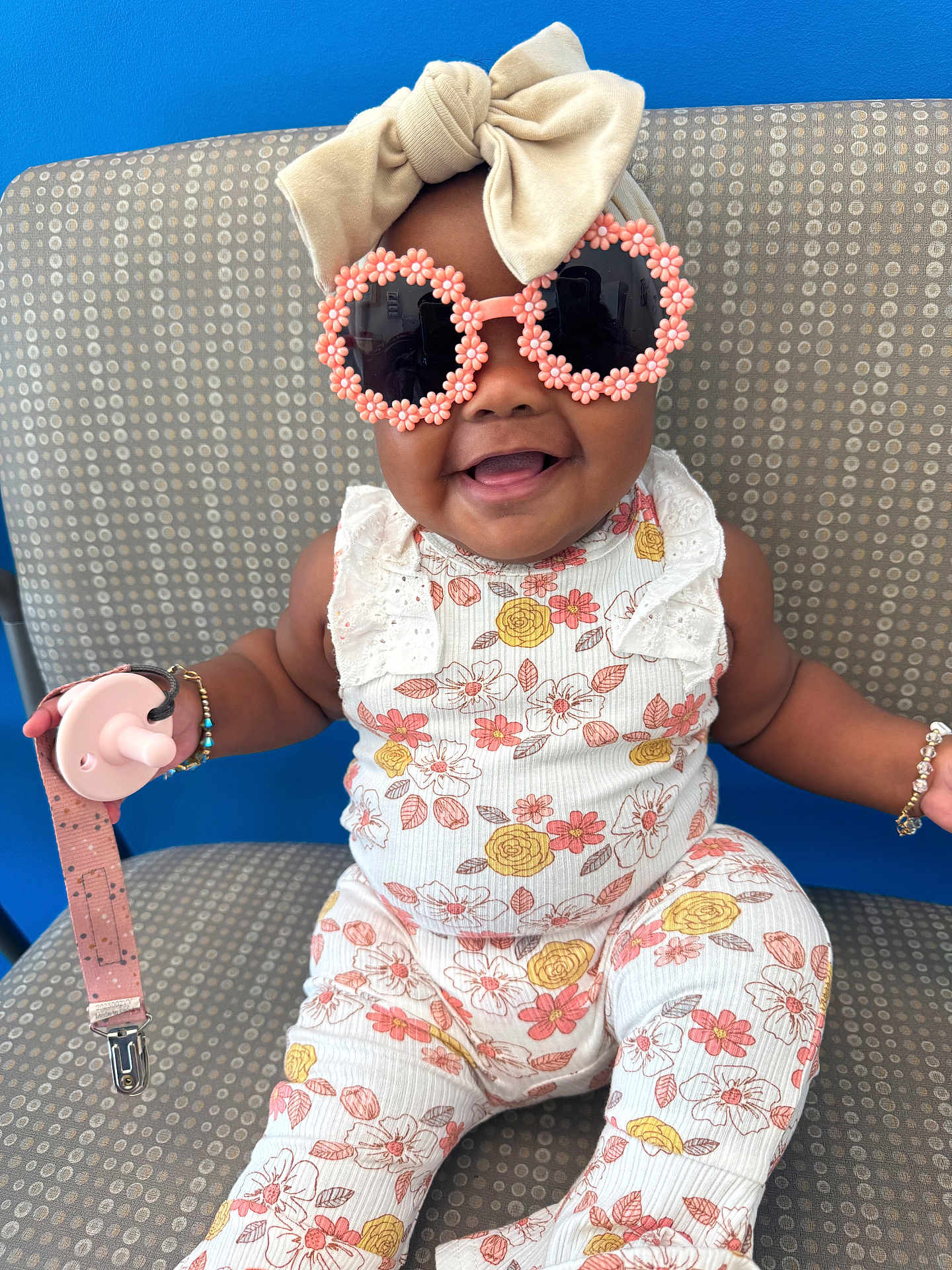 Walonii joined the competition — help win amazing prizes! baby, child, sunglasses, flower_pattern, bow_headband, pacifier, bracelet, smiling, seated, chair, patterned_fabric, cute, happy, accessory, fashion, indoors, portrait, cute_outfit, infant, playful