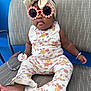 Walonii joined the competition — help win amazing prizes! baby, child, sunglasses, headband, bow, floral_outfit, pacifier, bracelet, chair, patterned_fabric, cute, fashion, indoor, portrait, person, footwearless, accessories, smile, seated, adorable