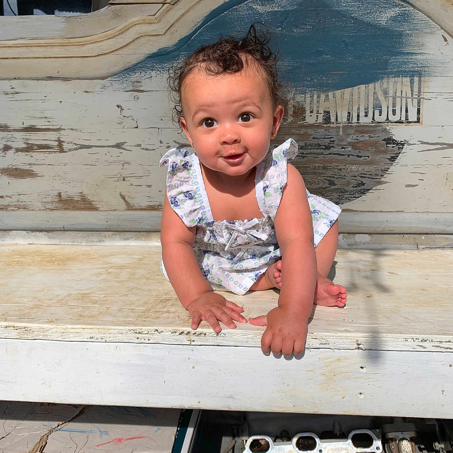 Lehlani joined the competition — help win amazing prizes! baby, bench, bodypart, clothing, crawling, dress, face, finger, furniture, hand, head, outdoors, pants, person, photography, plywood, portrait, sitting, t_shirt, wood