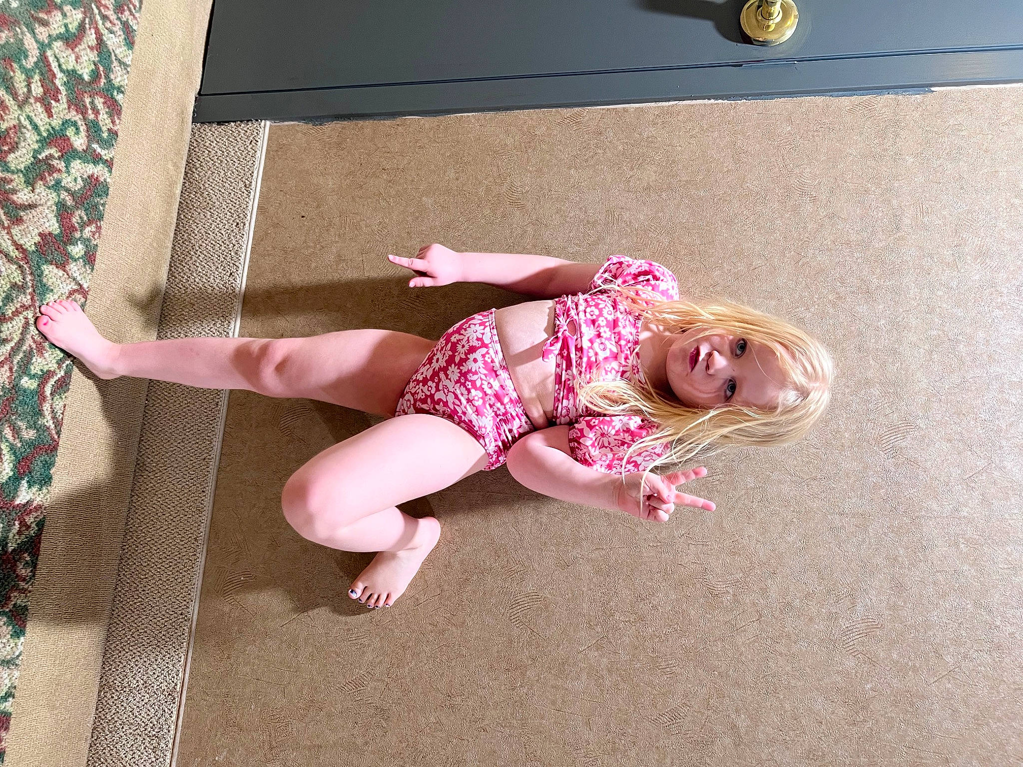 Adalee joined the competition — help win amazing prizes! barefoot, child, floor, flooring, foot, fun, human_leg, knee, leg, leisure, magenta, person, pink, sandal, shorts, sidewalk, sock, sunglasses, thigh, toddler