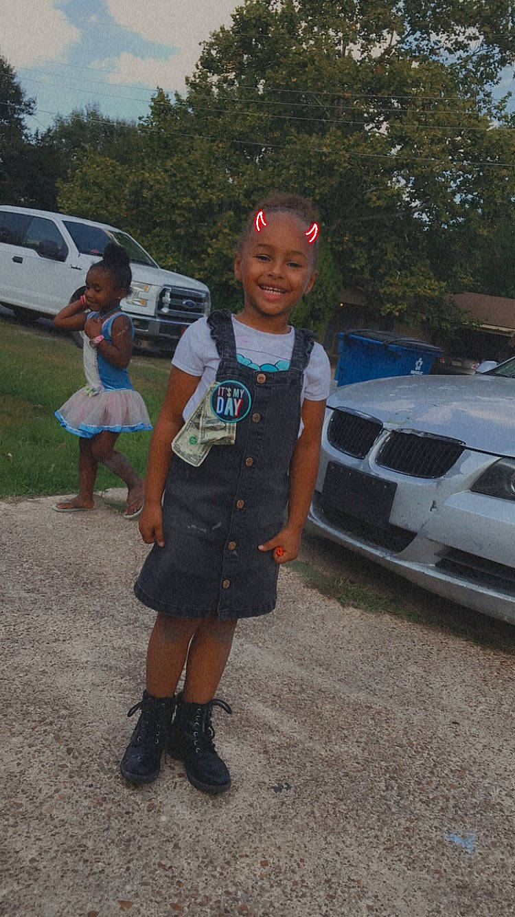 Scarlett Meyer joined the competition — help win amazing prizes! automotive_design, automotive_exterior, automotive_lighting, bumper, car, event, family_car, grille, hood, joy, land_vehicle, motor_vehicle, person, personal_luxury_car, rim, shorts, t_shirt, tire, tree, van