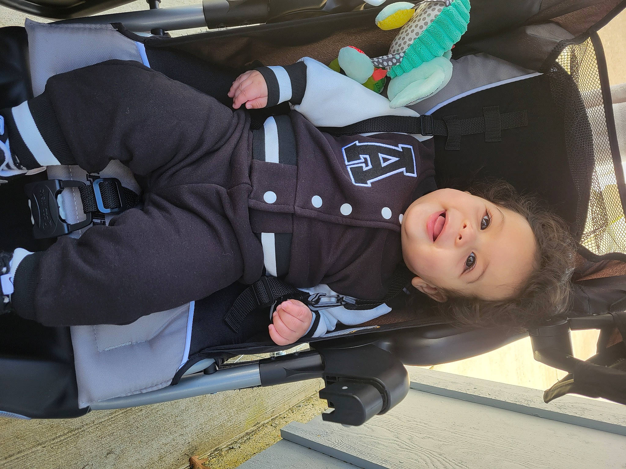 Jacomus Jameson Mclemore joined the competition — help win amazing prizes! auto_part, baby_products, car_seat, child, comfort, luxury_vehicle, motor_vehicle, person, sitting, smile, toddler, transport, travel, uniform