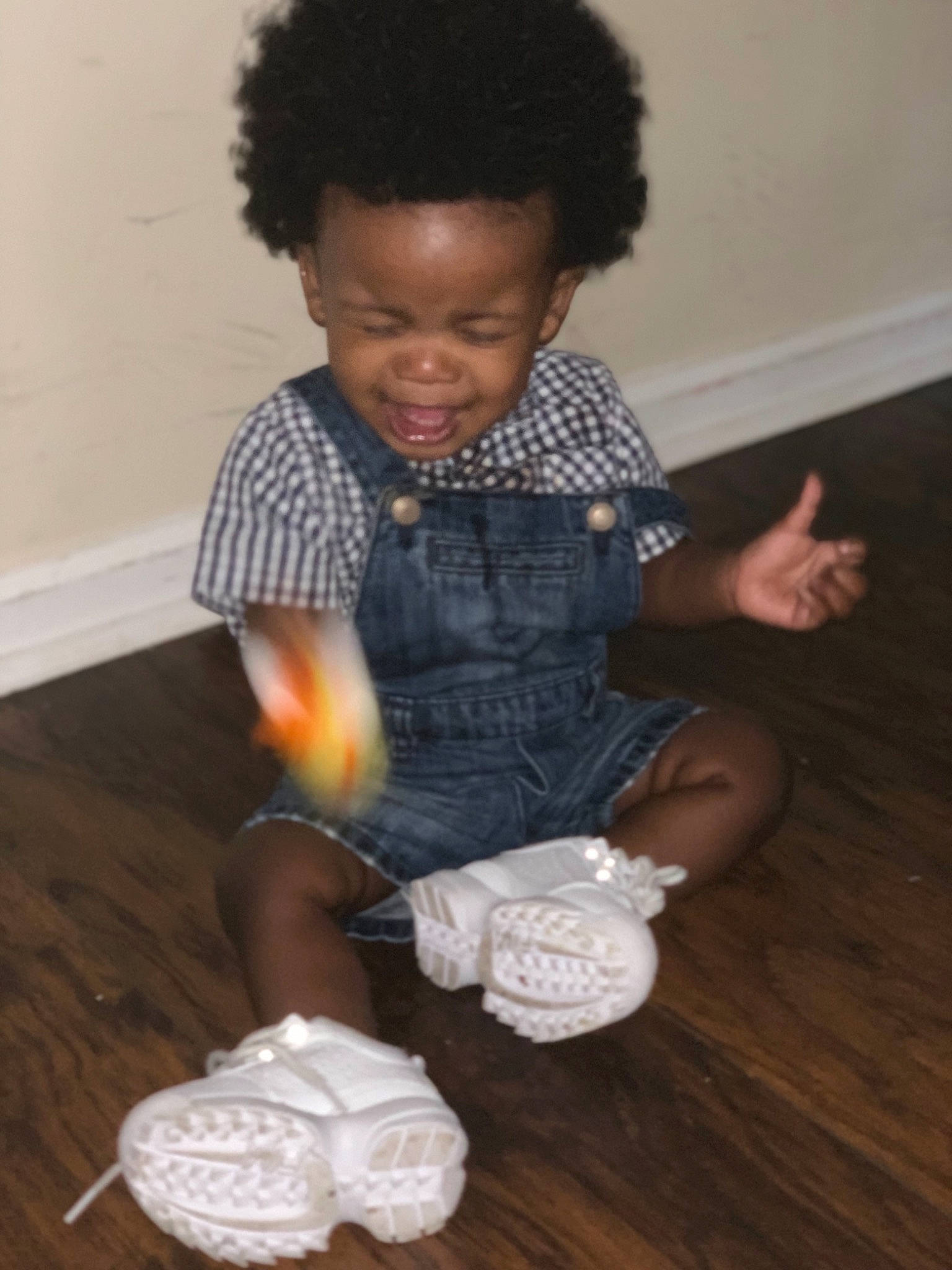 Ahmir is registered to the contest to win money with this photo: child, floor, flooring, hairstyle, joy, person, play, toddler, wool