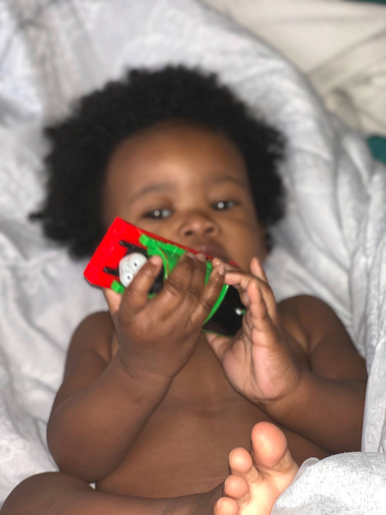 Ahmir is registered to the contest to win money with this photo: baby, black_hair, child, finger, lip, mouth, nail, neck, nose, person, skin, smile, toddler
