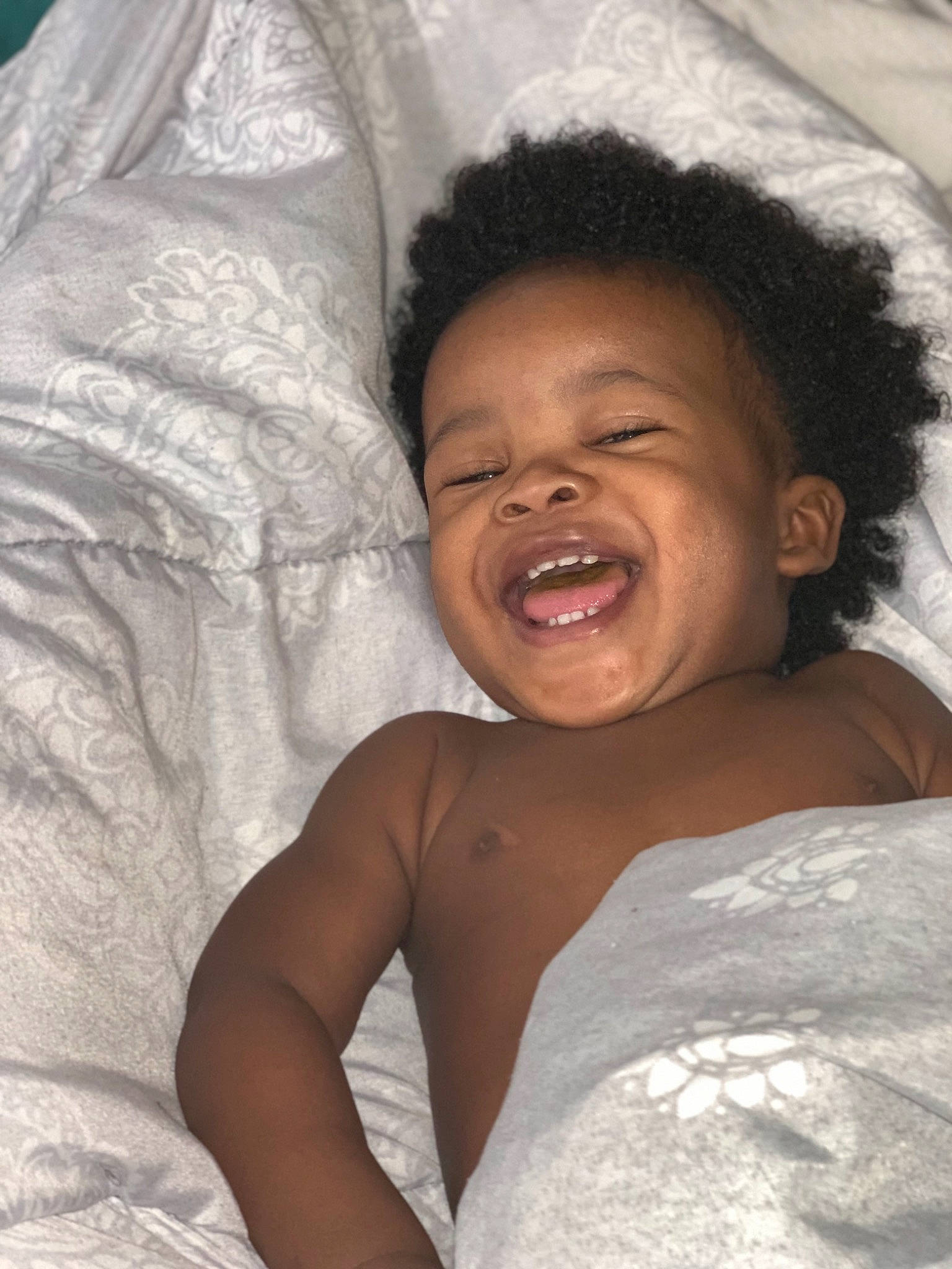 Ahmir is registered to the contest to win money with this photo: baby, beauty, child, eye, face, facial_expression, fun, hair, happy, head, laugh, linens, lip, mouth, nose, people, person, skin, smile, textile