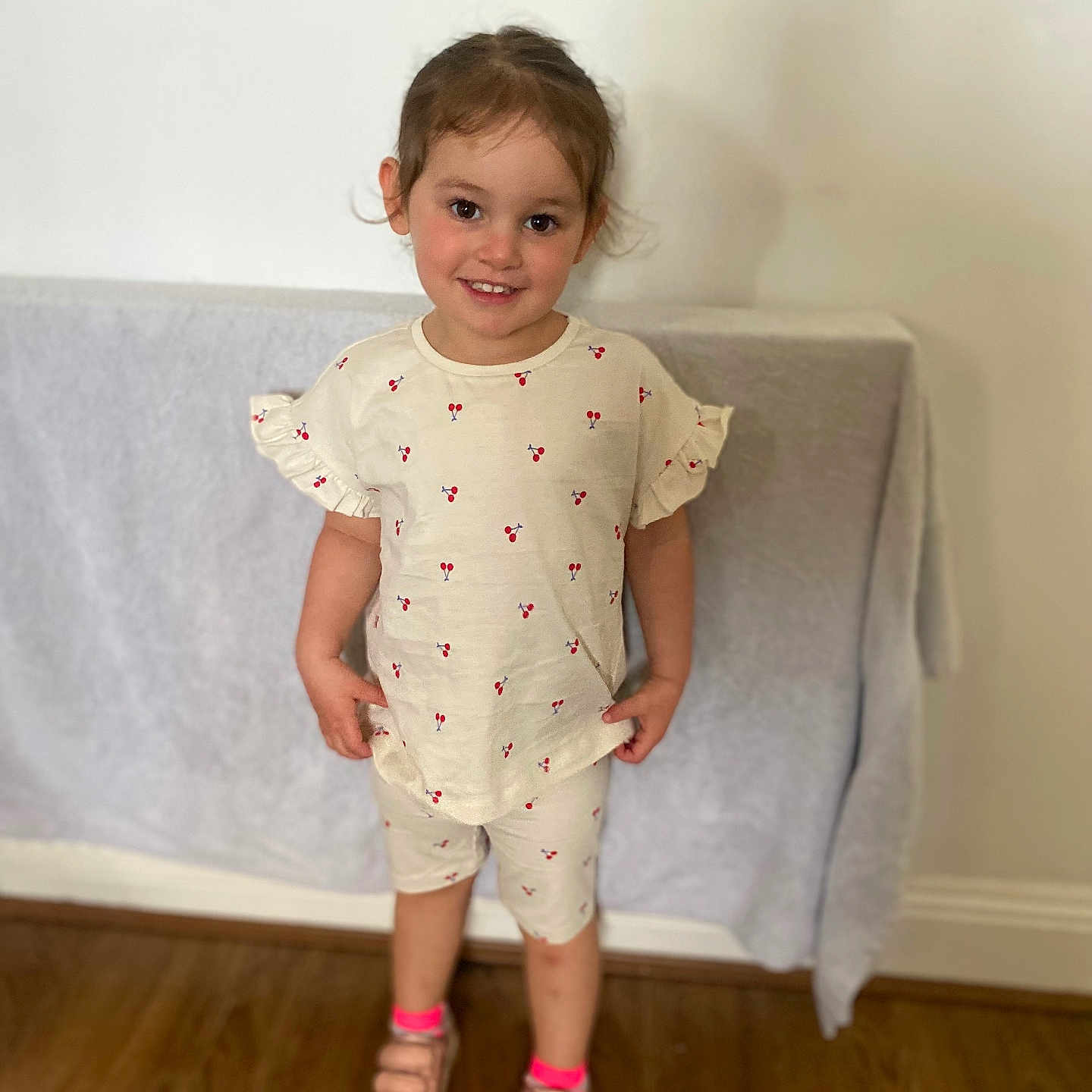 Esme joined the competition — help win amazing prizes! blouse, child, clothing, face, female, footwear, girl, head, homedecor, linen, pants, person, photography, portrait, sandal, shoe, shorts, sleeve, standing, wood