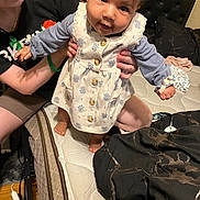 Nova joined the competition — help win amazing prizes! adult, baby, bed, blanket, child, clothing, curly_hair, dress, foot, furniture, glasses, hand, headband, holding, indoor, mattress, person, pillow, skin, smile
