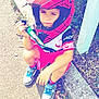 Timothè participe au concours pour gagner de l'argent avec cette photo : casual, child, crouching, curb, grass, helmet, key, keychain, leaves, outdoor, person, playful, shorts, sidewalk, sneakers, socks, spiderman, sunlight, toy, tshirt