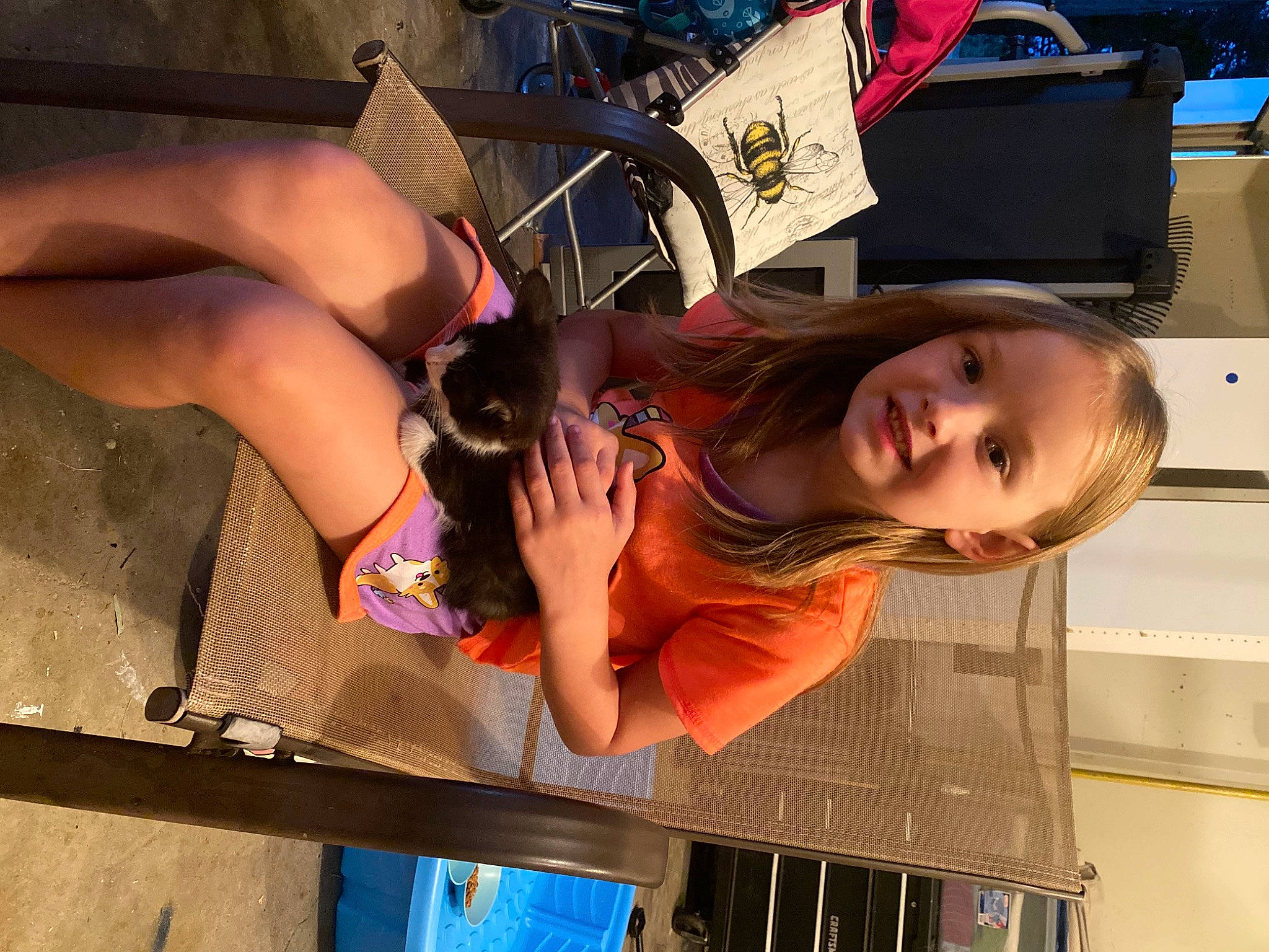 Arya is registered to the contest to win money with this photo: black_hair, calf, dress, elbow, eyewear, fashion, finger, foot, fun, human_leg, knee, leisure, long_hair, mouth, person, sandal, smile, thigh, tire, toddler