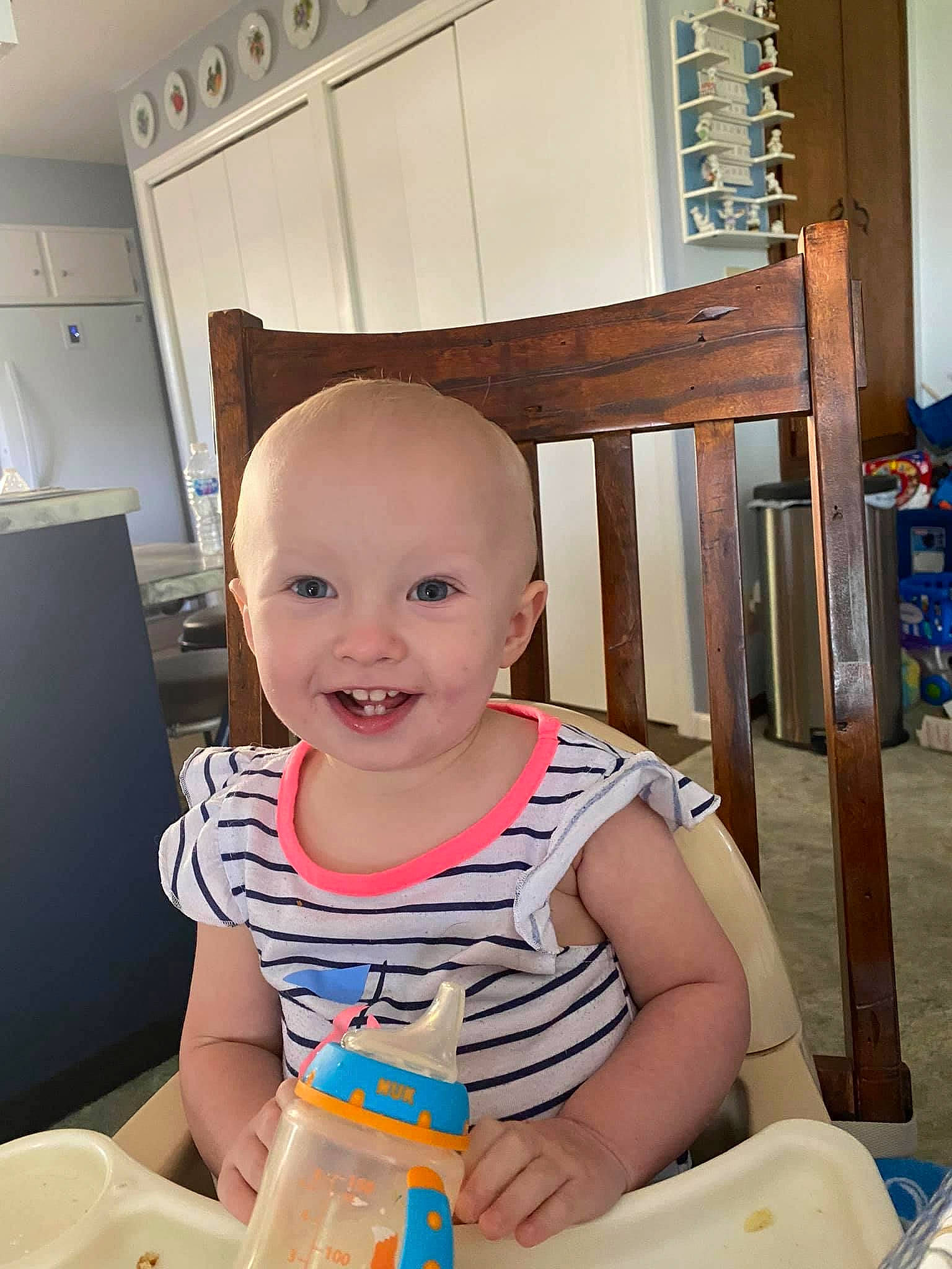 Avacyn is registered to the contest to win money with this photo: baby, baby_products, baby_toddler_clothing, chair, child, event, flooring, fun, happy, hardwood, joy, person, play, room, sitting, skin, smile, standing, toddler, vacation