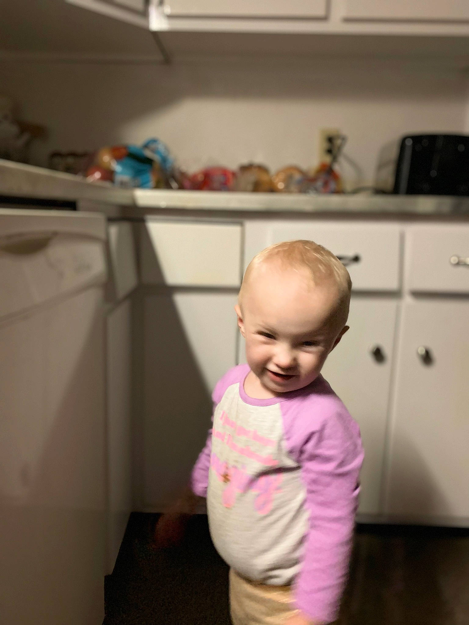 Avacyn is registered to the contest to win money with this photo: baby, baby_toddler_clothing, cabinetry, child, cooktop, countertop, cupboard, drawer, flooring, home_appliance, homemaker, joy, kitchen, kitchen_appliance, kitchen_stove, major_appliance, person, room, sleeve, smile