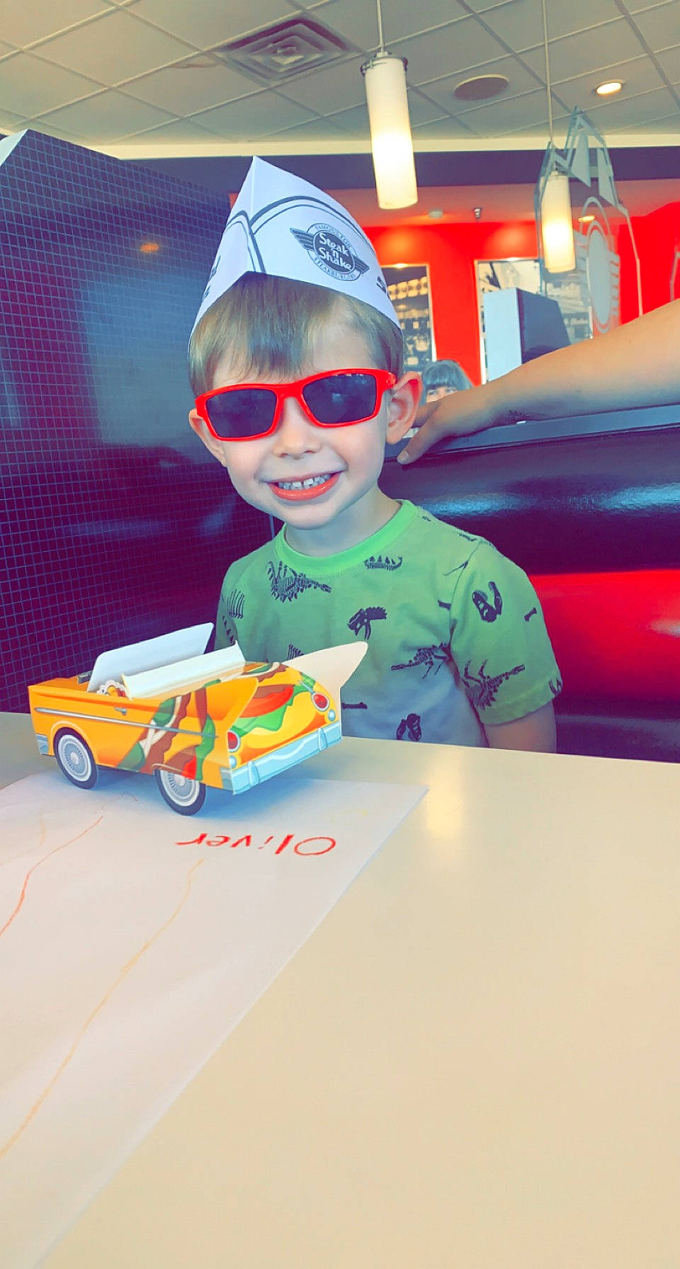 Oliver joined the competition — help win amazing prizes! airplane, art, automotive_design, baseball_cap, cap, carmine, child, eyewear, fun, goggles, joy, person, personal_protective_equipment, play, recreation, smile, sunglasses, toddler, toy, travel