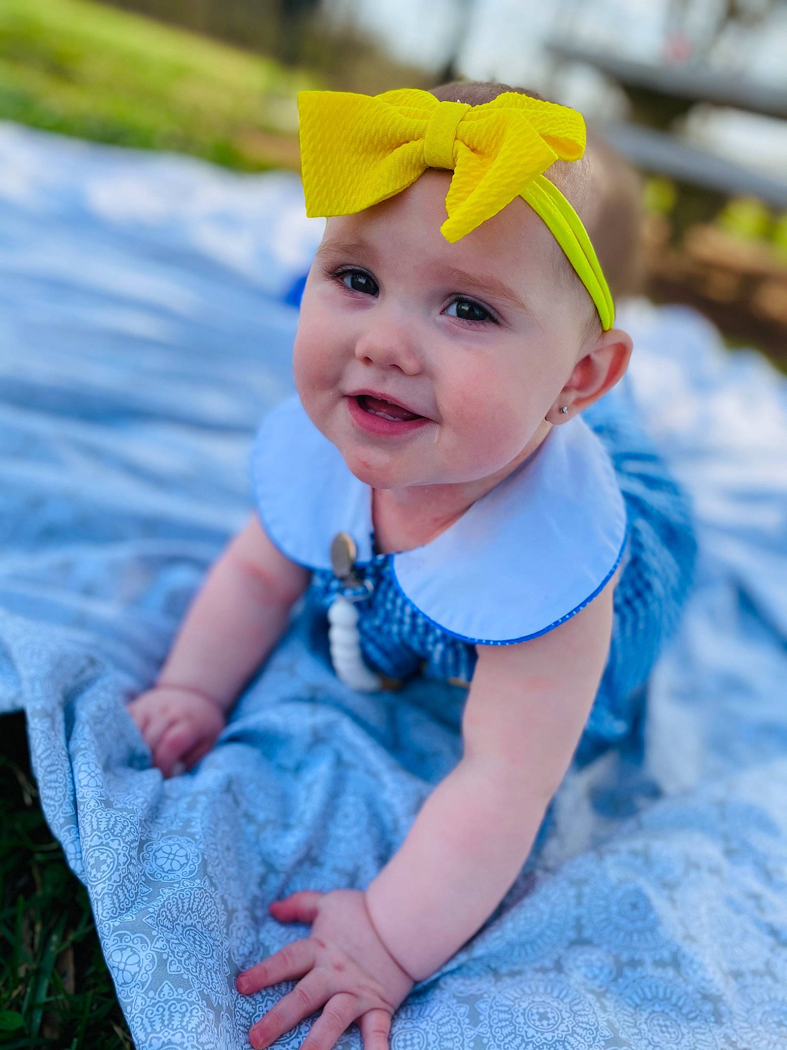 Mckenna joined the competition — help win amazing prizes! azure, baby, baby_toddler_clothing, blue, child, eye, face, facial_expression, fun, grass, happy, hat, headgear, headwear, iris, person, plant, purple, skin, smile