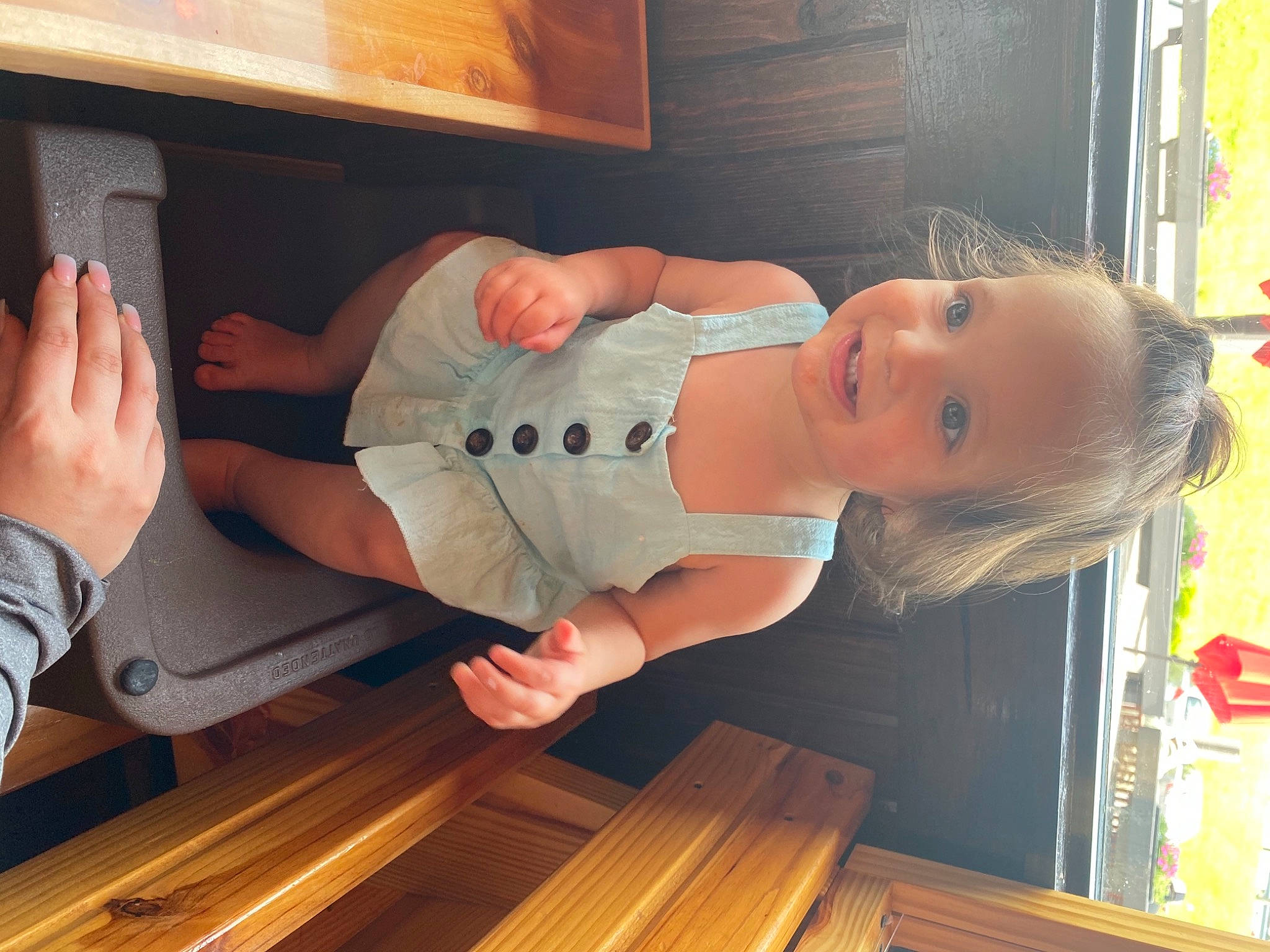 Cecilia is registered to the contest to win money with this photo: baby_toddler_clothing, child, comfort, elbow, finger, flooring, foot, fun, hardwood, human_leg, joint, joy, knee, leg, muscle, person, shoulder, standing, thigh, thumb