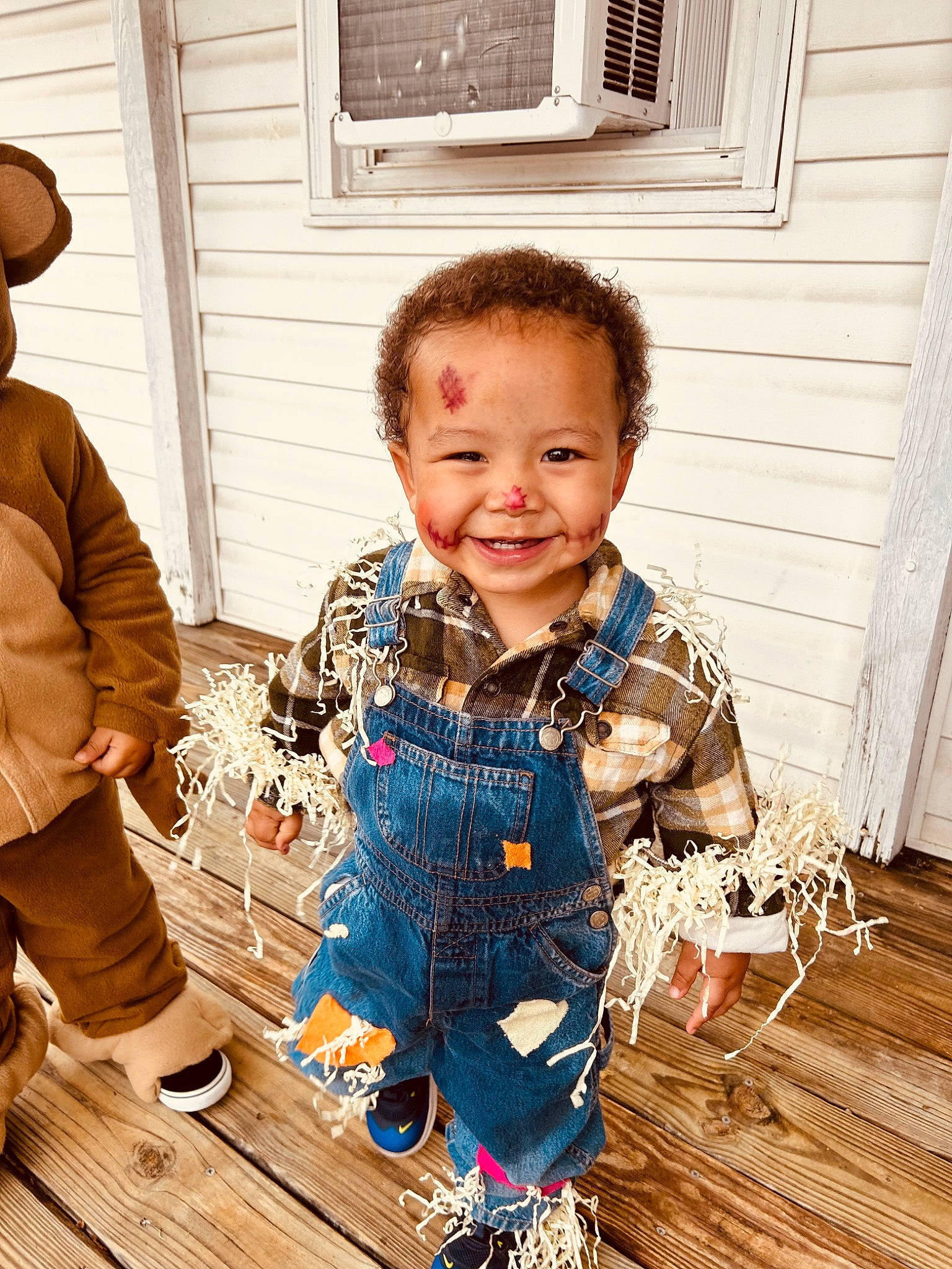Kingston is registered to the contest to win money with this photo: baby, baby_toddler_clothing, child, door, floor, flooring, fun, happy, hardwood, joy, pattern, person, play, sitting, sleeve, smile, t_shirt, toddler, window, wood