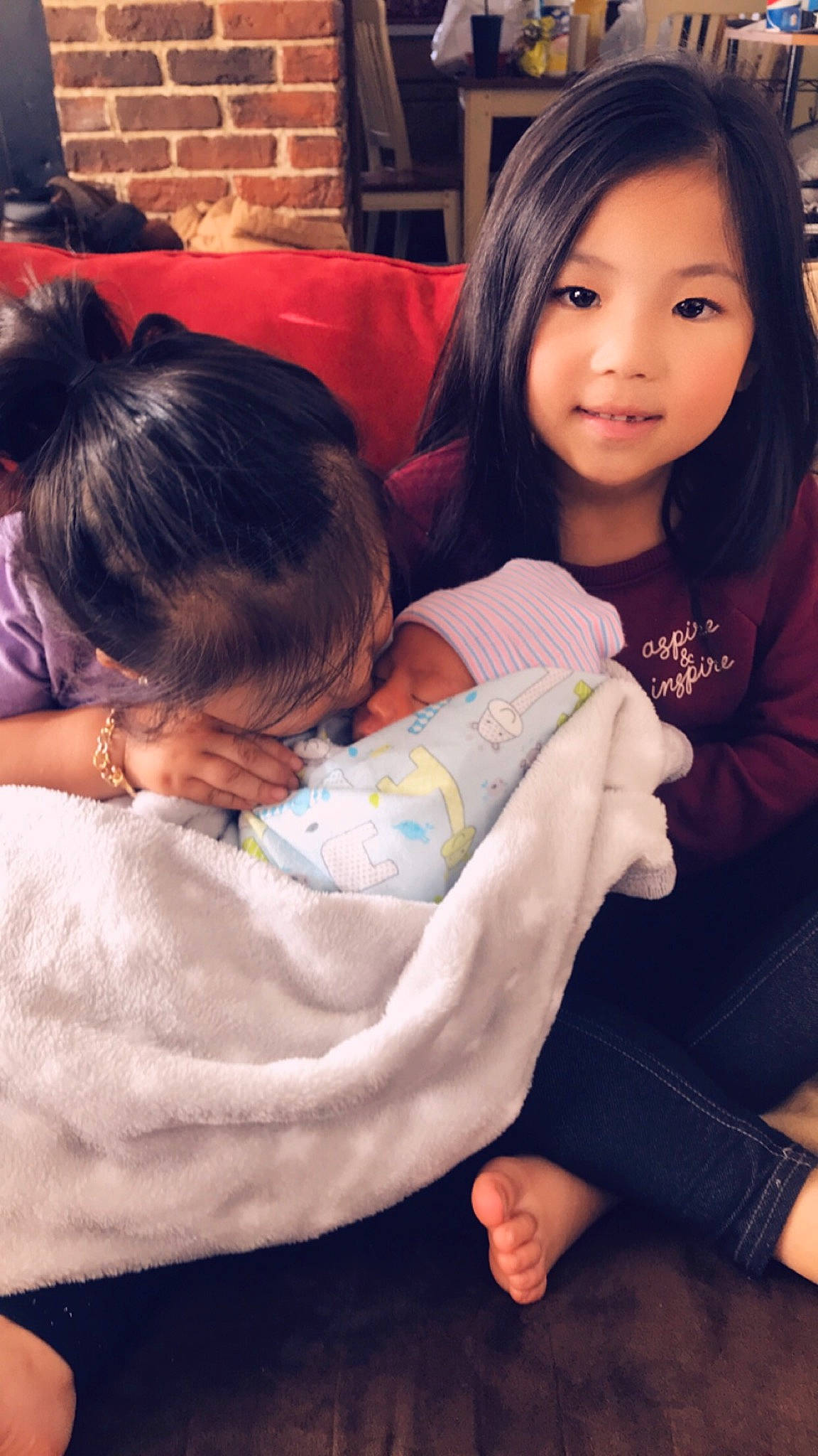 Mila is registered to the contest to win money with this photo: baby, beauty, black_hair, cheek, child, daughter, mother, person, skin, smile, toddler