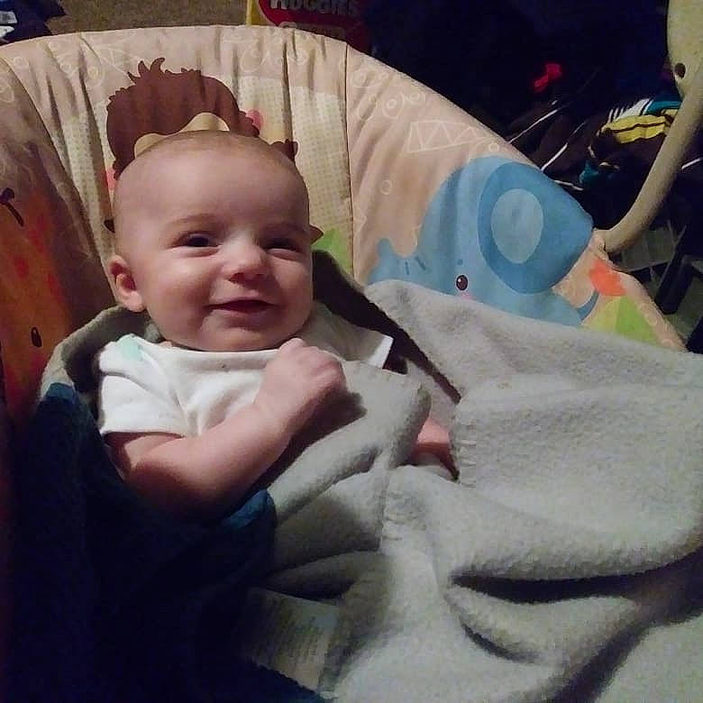 Nova is registered to the contest to win money with this photo: arm, boy, cheek, child, day, ear, eye, face, finger, forehead, head, infant, joy, mouth, nose, organ, person, product, skin, smile