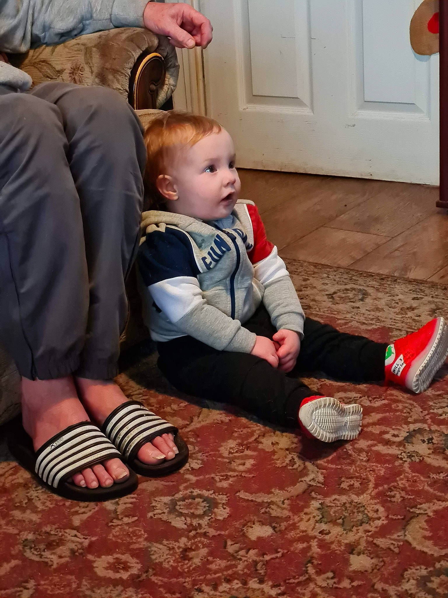 Toby Dickinson joined the competition — help win amazing prizes! ankle, baby, baby_toddler_clothing, carmine, carpet, child, comfort, door, floor, flooring, foot, joint, knee, lap, nail, person, shoe, slipper, sock, toddler