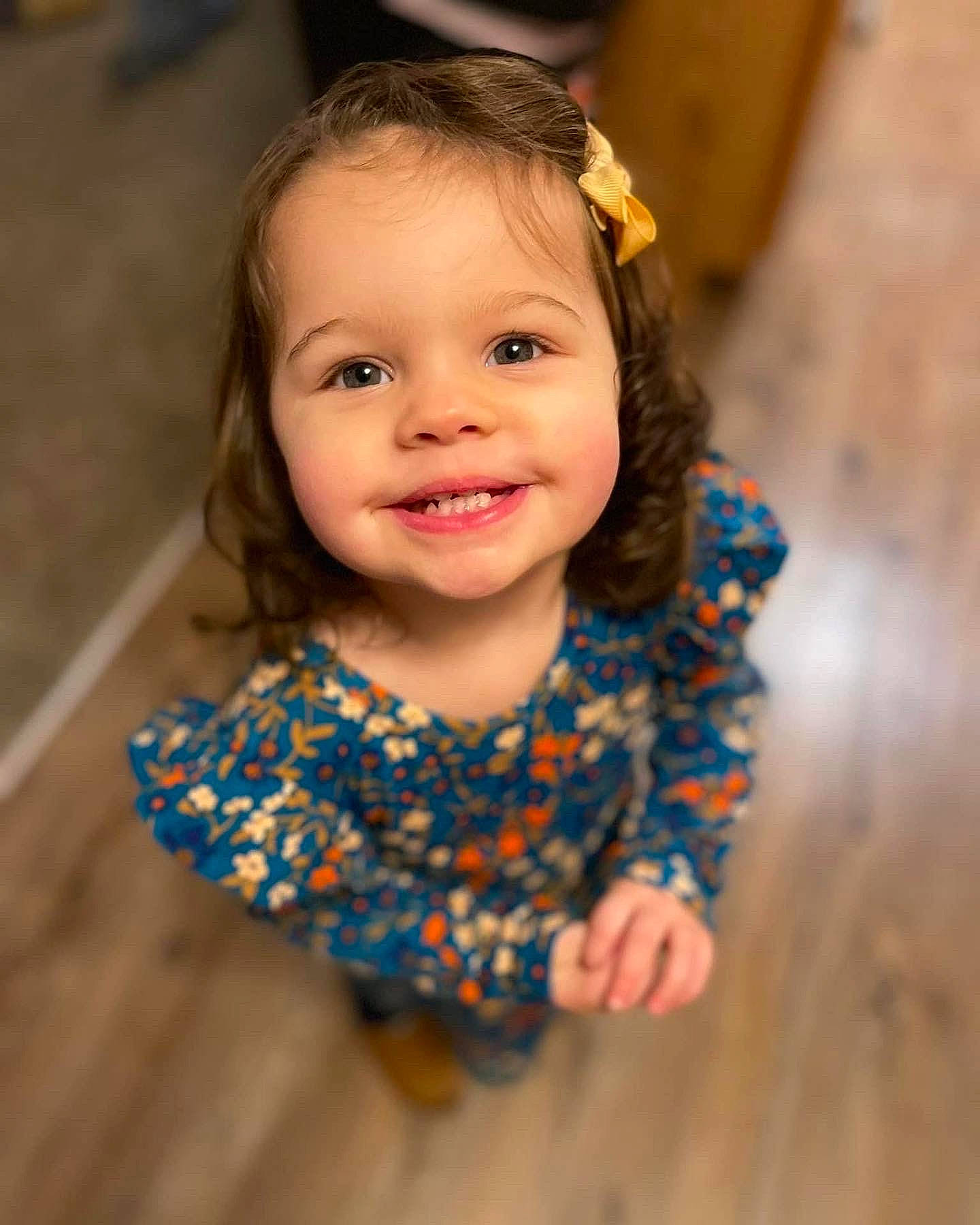 Lina is registered to the contest to win money with this photo: baby, baby_toddler_clothing, child, dress, electric_blue, eye, flash_photography, flooring, fun, hair, happy, headgear, human_body, iris, joy, lip, person, skin, sleeve, smile