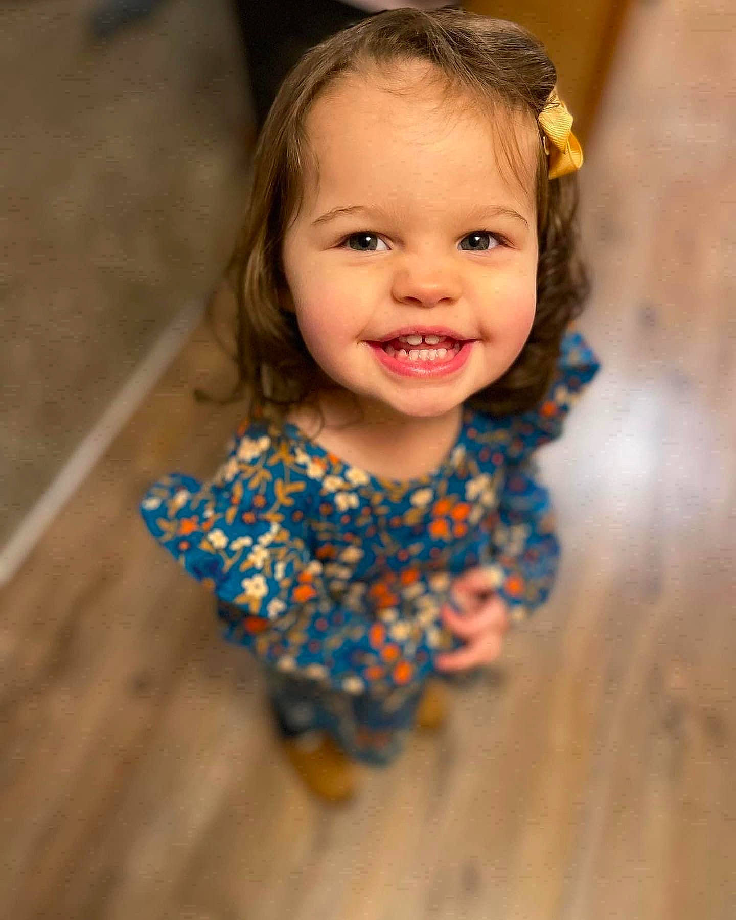 Lina is registered to the contest to win money with this photo: baby, baby_toddler_clothing, chin, dance, day_dress, dress, electric_blue, entertainment, eye, face, flash_photography, flooring, hair, happy, head, human_body, iris, joy, person, smile