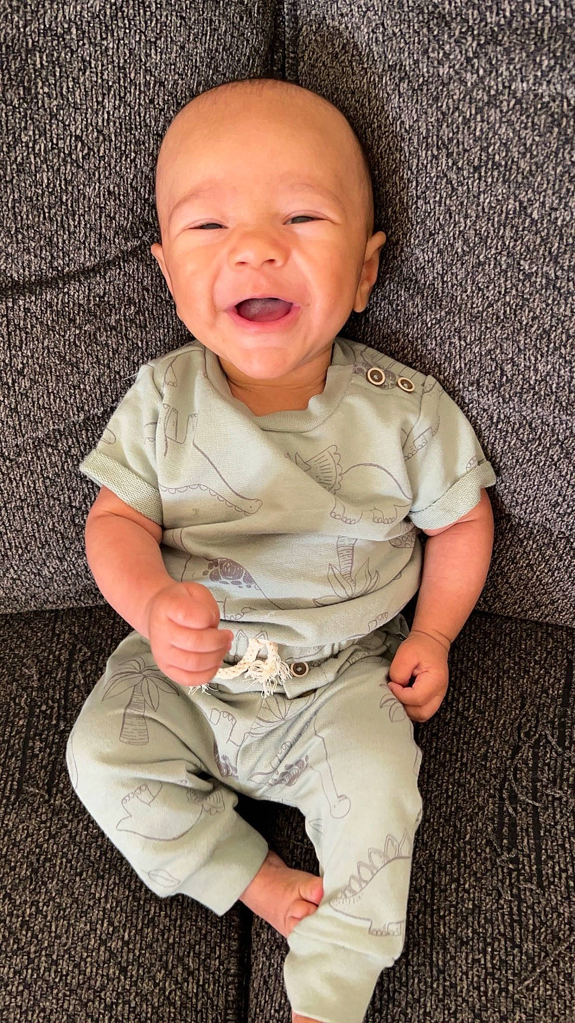 Khyrie joined the competition — help win amazing prizes! baby, baby_toddler_clothing, cheek, child, comfort, eye, gesture, grass, happy, human_body, lip, mouth, neck, nose, person, sitting, skin, sleeve, smile, t_shirt