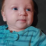 Bowen J. joined the competition — help win amazing prizes! baby, infant, child, blue_eyes, striped_clothing, onesie, face, portrait, cute, resting, cushion, indoor, young_child, person, looking_away, soft_lighting, head, skin, expression, teal