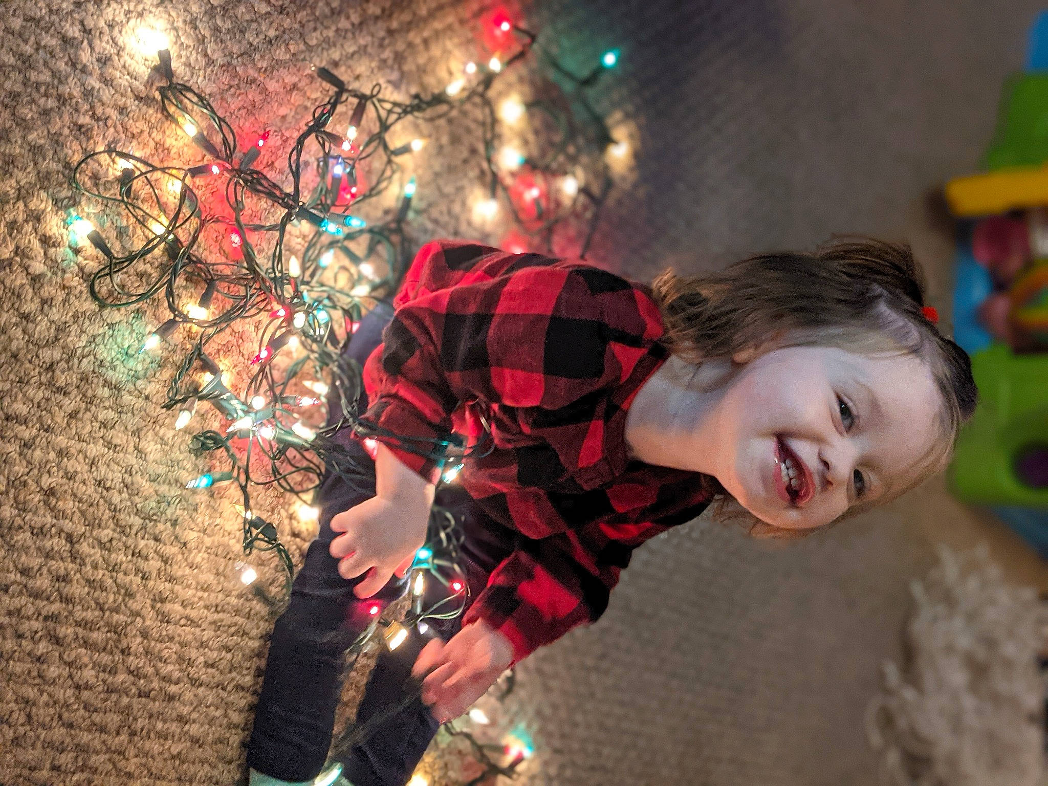 Vada is registered to the contest to win money with this photo: christmas, christmas_decoration, christmas_eve, christmas_lights, christmas_ornament, christmas_tree, festival, holiday, holiday_ornament, joy, ornament, person, plaid, portrait_photography, tartan