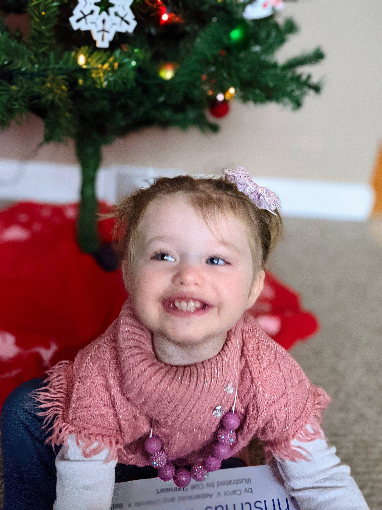 Vada joined the competition — help win amazing prizes! baby, baby_toddler_clothing, child, christmas, christmas_decoration, christmas_eve, christmas_ornament, costume_accessory, facial_expression, hair_accessory, happy, holiday, holiday_ornament, interior_design, joy, laugh, ornament, person, pink, smile