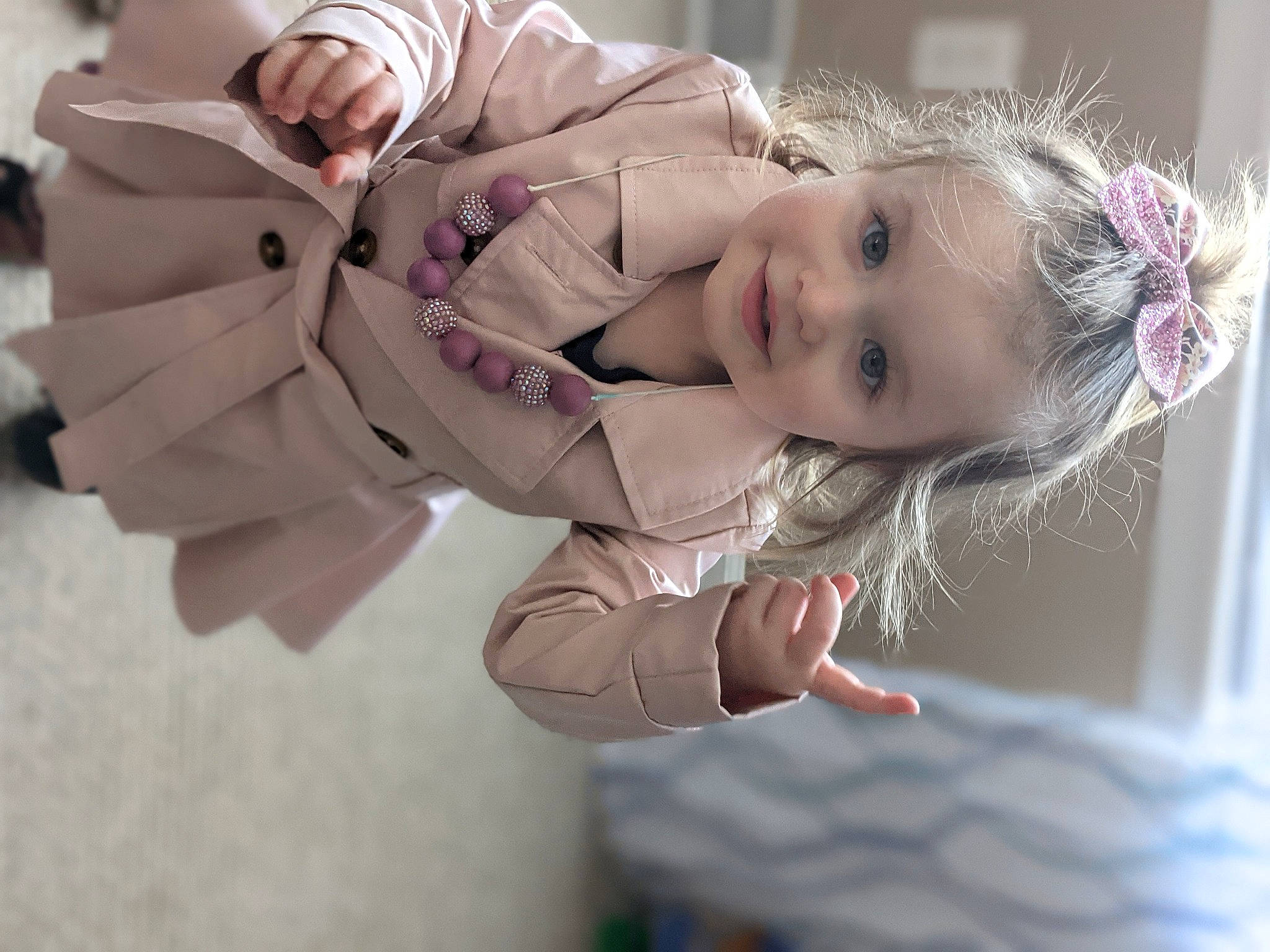 Vada joined the competition — help win amazing prizes! baby, baby_toddler_clothing, blond, cheek, child, child_model, eye, facial_expression, happy, human, joy, nose, parka, person, pink, playing_with_kids, portrait_photography, skin, toddler, winter
