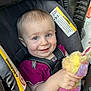 Nevaeh joined the competition — help win amazing prizes! baby, child, car_seat, blue_eyes, smile, toy, plush_toy, seatbelt, clothing, pink_shirt, happy, infant, portrait, close_up, indoor, cute, person, hand, face, sitting