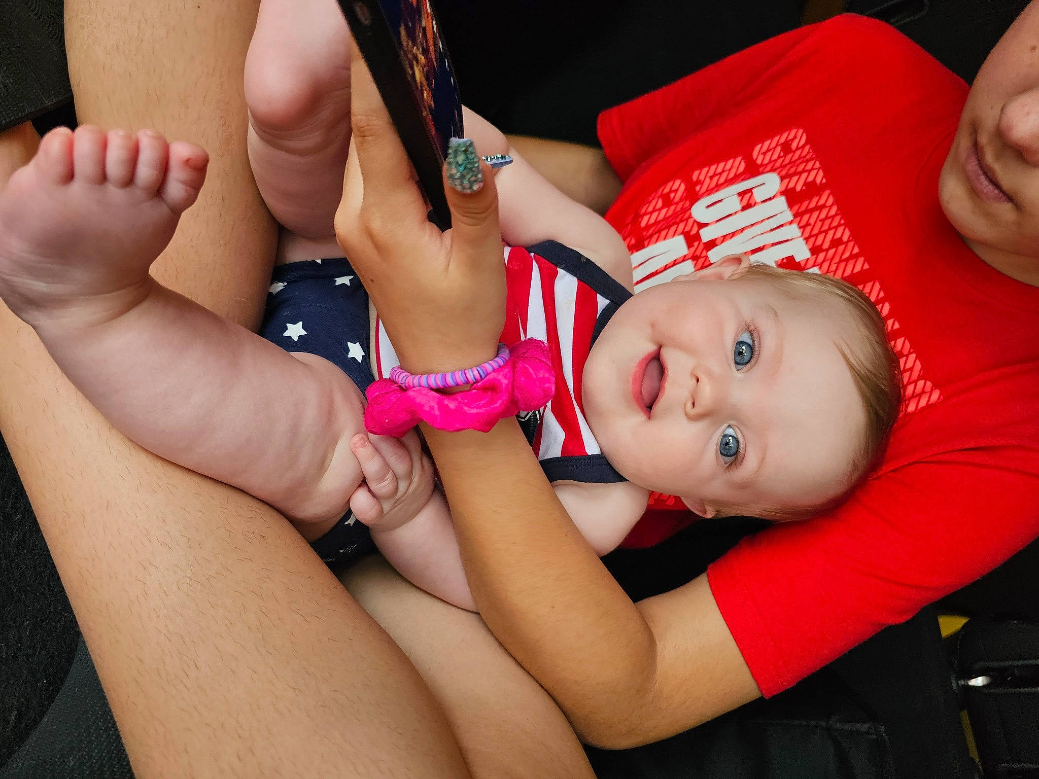 Daisy is registered to the contest to win money with this photo: arm, baby, baby_toddler_clothing, child, dress, eyelash, finger, gesture, hand, happy, leg, lip, mouth, muscle, nail, person, pink, skin, thigh, thumb