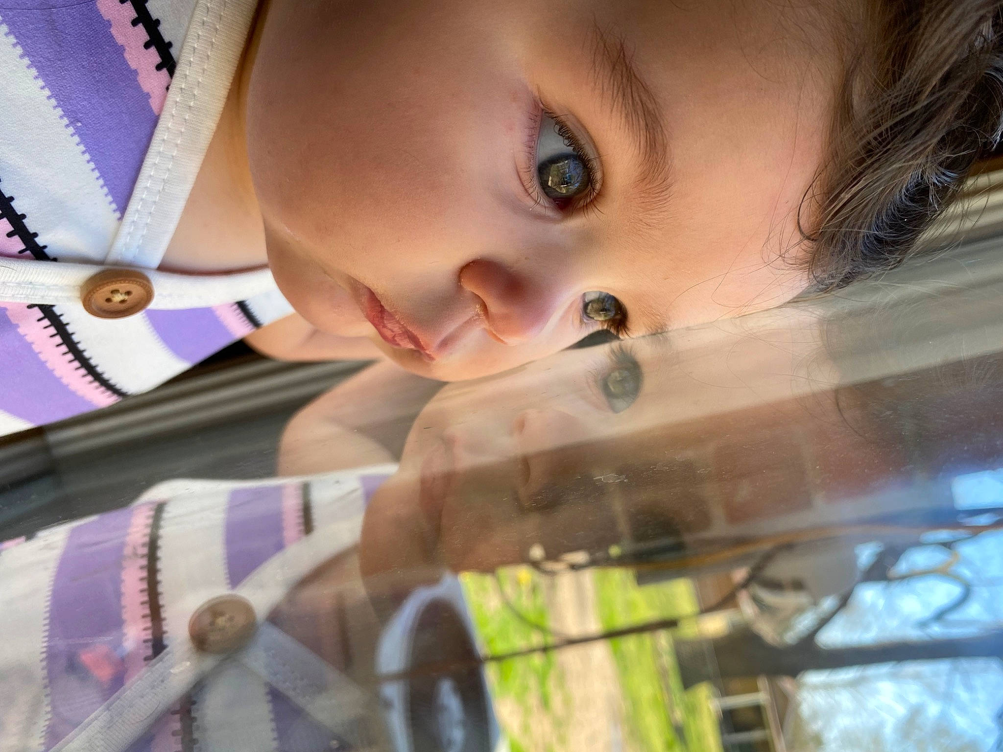 Gracelynn is registered to the contest to win money with this photo: cheek, chin, dress, eye, eyebrow, eyelash, fedora, grass, happy, iris, lip, mouth, nose, organ, person, photograph, plant, skin, toddler, tree