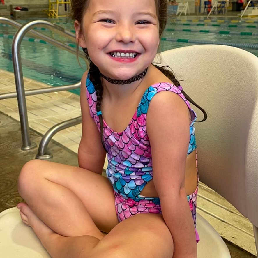 Brooklynn is registered to the contest to win money with this photo: child, clothing, cream, face, female, girl, head, leisureactivities, person, photography, pool, portrait, shorts, sport, summer, swimming, swimmingpool, swimwear, water, watersports