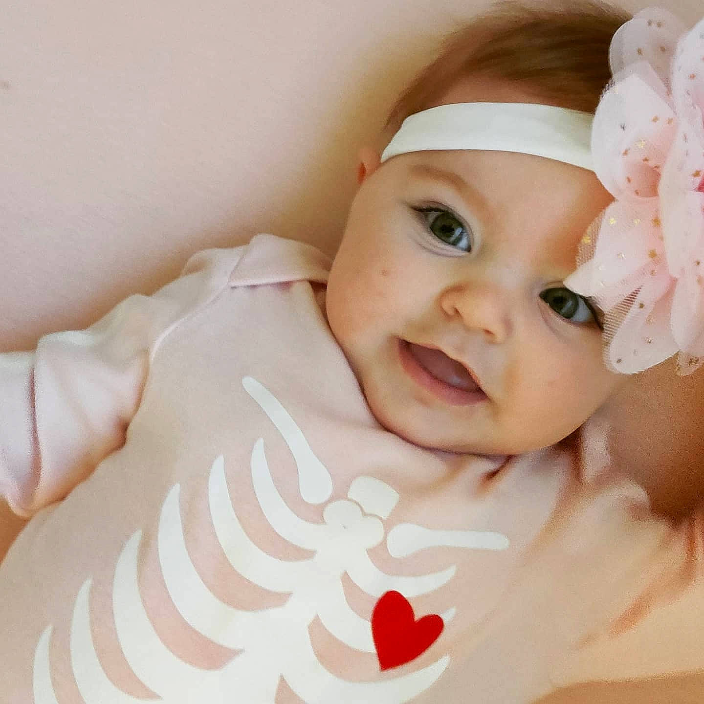 Everlee is registered to the contest to win money with this photo: baby, baby_toddler_clothing, cheek, chin, ear, eye, eyebrow, eyelash, finger, happy, head, headwear, iris, lip, mouth, neck, nose, person, pink, skin