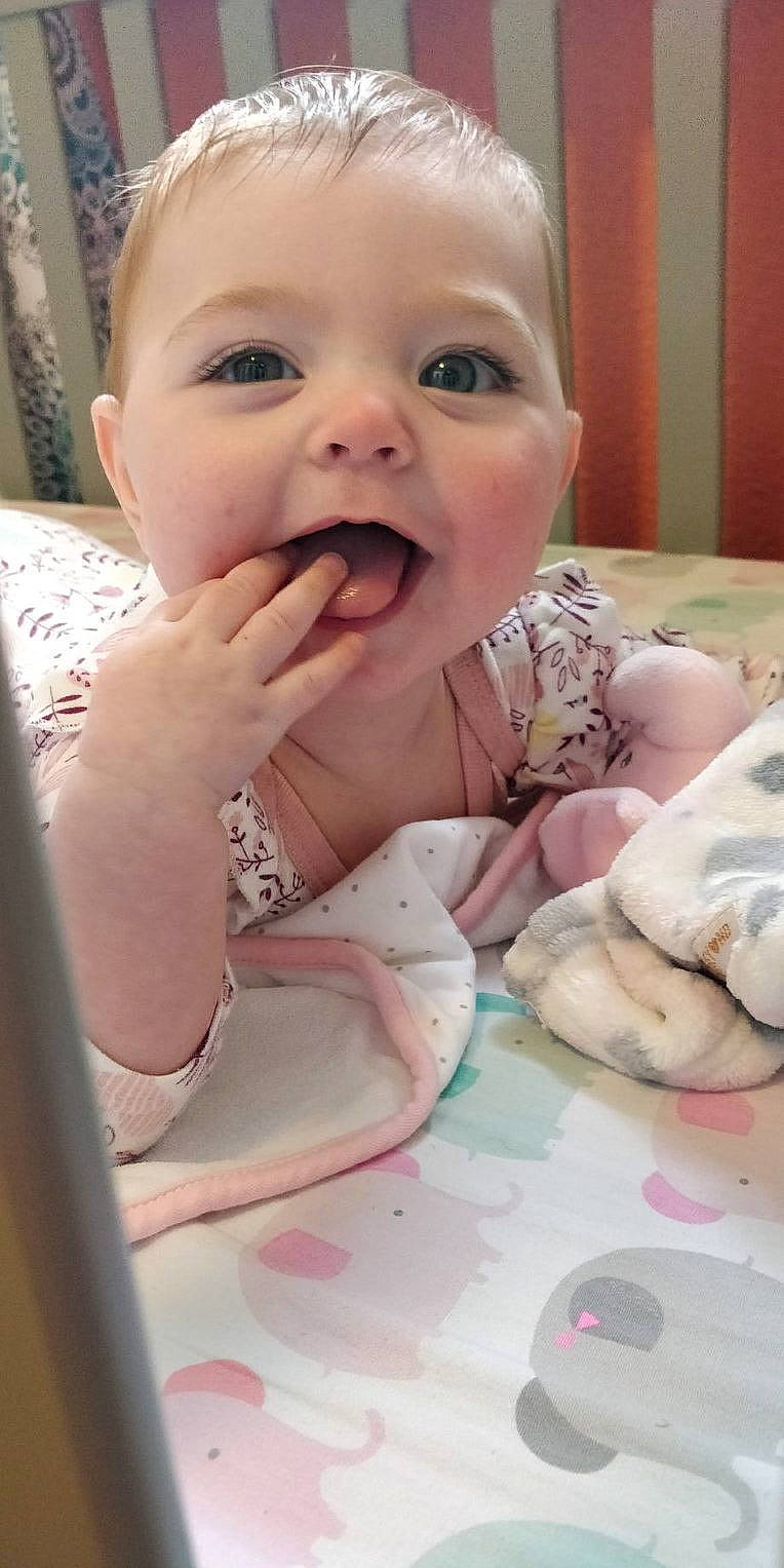 Everlee joined the competition — help win amazing prizes! baby, baby_playing_with_food, baby_toddler_clothing, cheek, eyebrow, eyelash, face, finger, food_craving, gesture, happy, head, iris, lip, mouth, nose, person, pink, skin, smile