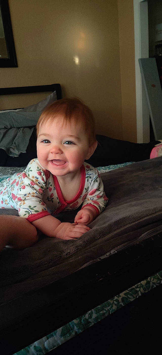 Everlee joined the competition — help win amazing prizes! baby, baby_toddler_clothing, cheek, chin, comfort, face, finger, flash_photography, floor, flooring, hardwood, head, iris, joy, mouth, nose, person, skin, sleeve, smile