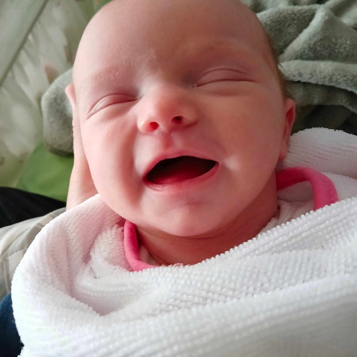 Ameana is registered to the contest to win money with this photo: architecture, baby, babylaughing, blanket, building, clothing, crying, face, glove, happy, head, hospital, laughing, newborn, person, photography, portrait, quilt, sad, towel