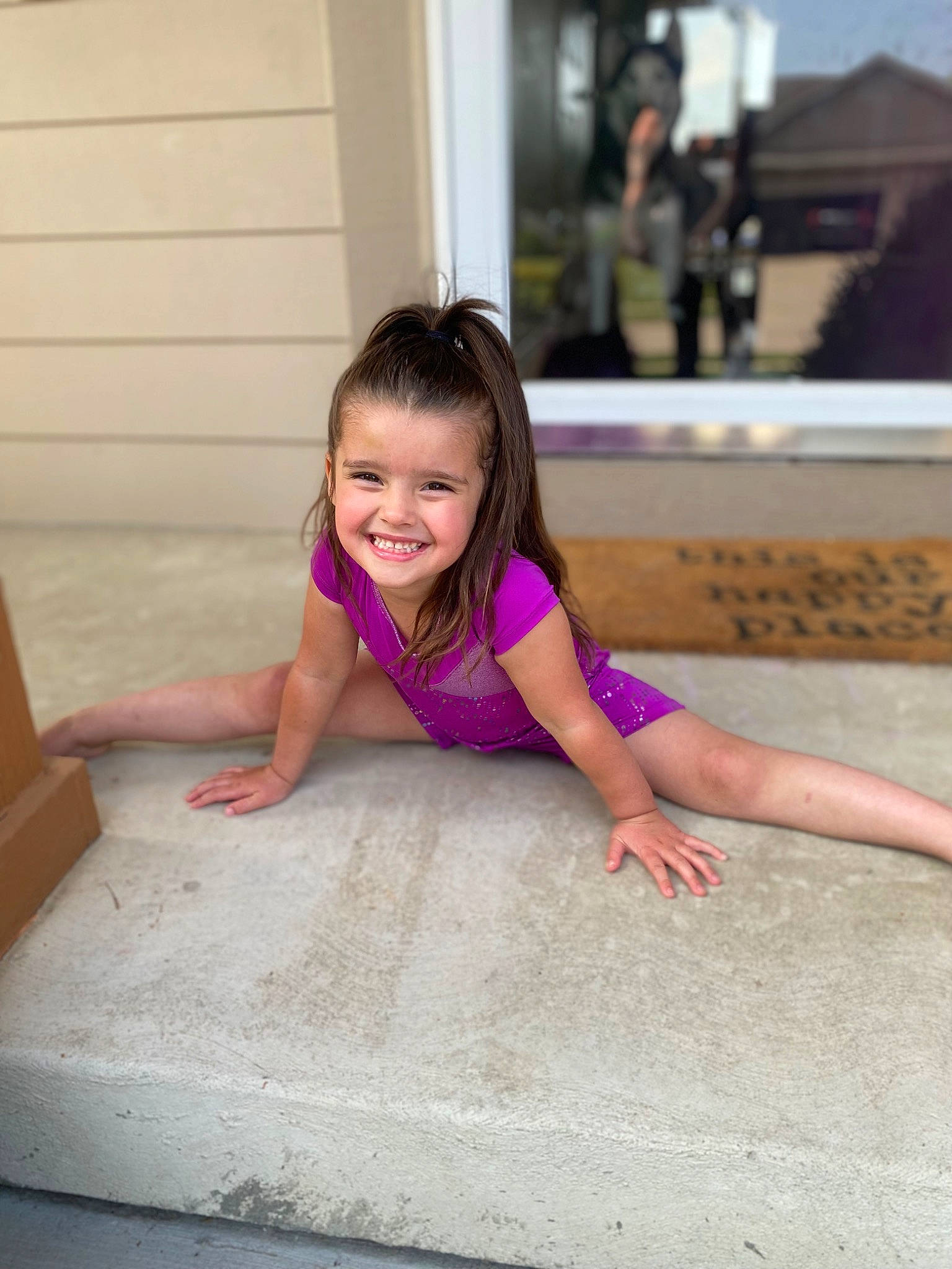 Dawson is registered to the contest to win money with this photo: baby_toddler_clothing, barefoot, child, crawling, floor, flooring, fun, grass, happy, hardwood, joy, leisure, magenta, person, pink, room, sand, sitting, smile, t_shirt