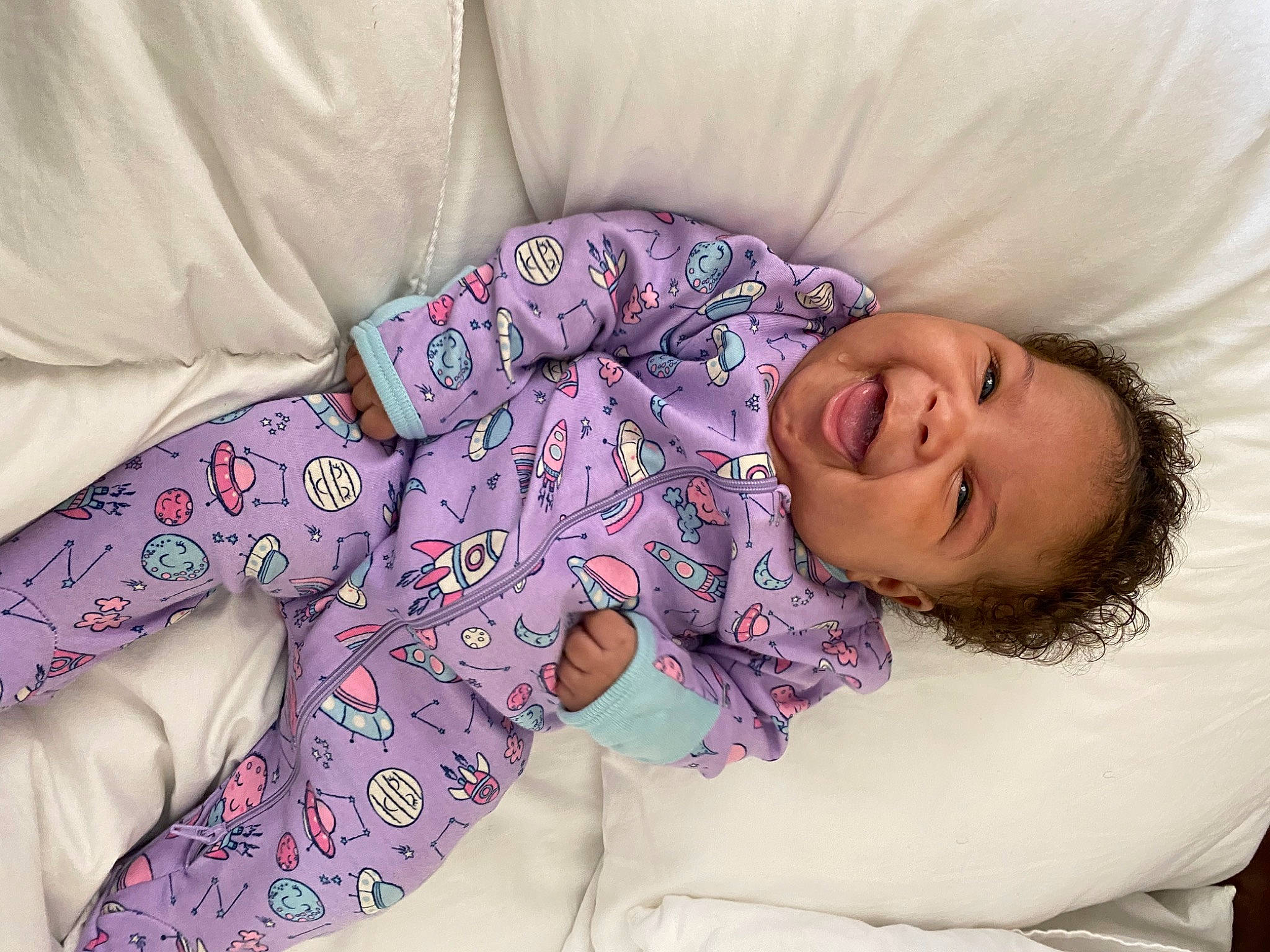 Keyslei joined the competition — help win amazing prizes! baby, baby_products, baby_sleeping, baby_toddler_clothing, bedding, bedtime, child, comfort, linens, magenta, nap, pattern, person, pink, purple, skin, sleep, sleeve, smile, textile