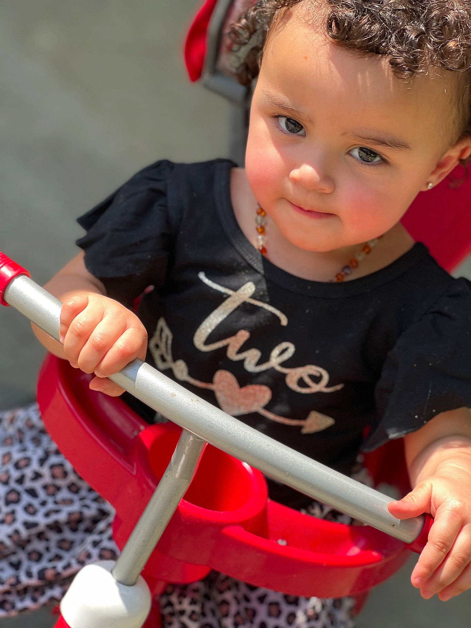 Eydi Grace is registered to the contest to win money with this photo: advertising, arm, baby_playing_with_toys, baby_toddler_clothing, child, facial_expression, fashion_accessory, font, fun, hand, happy, headband, headpiece, joy, leisure, organ, person, photograph, play, recreation