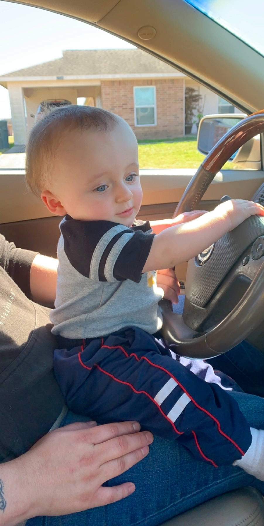 Braxtyn joined the competition — help win amazing prizes! auto_part, automotive_window_part, baby, car, car_seat, child, driving, family_car, hand, luxury_vehicle, person, product, seat_belt, steering_part, steering_wheel, toddler, vehicle, vehicle_door, windshield