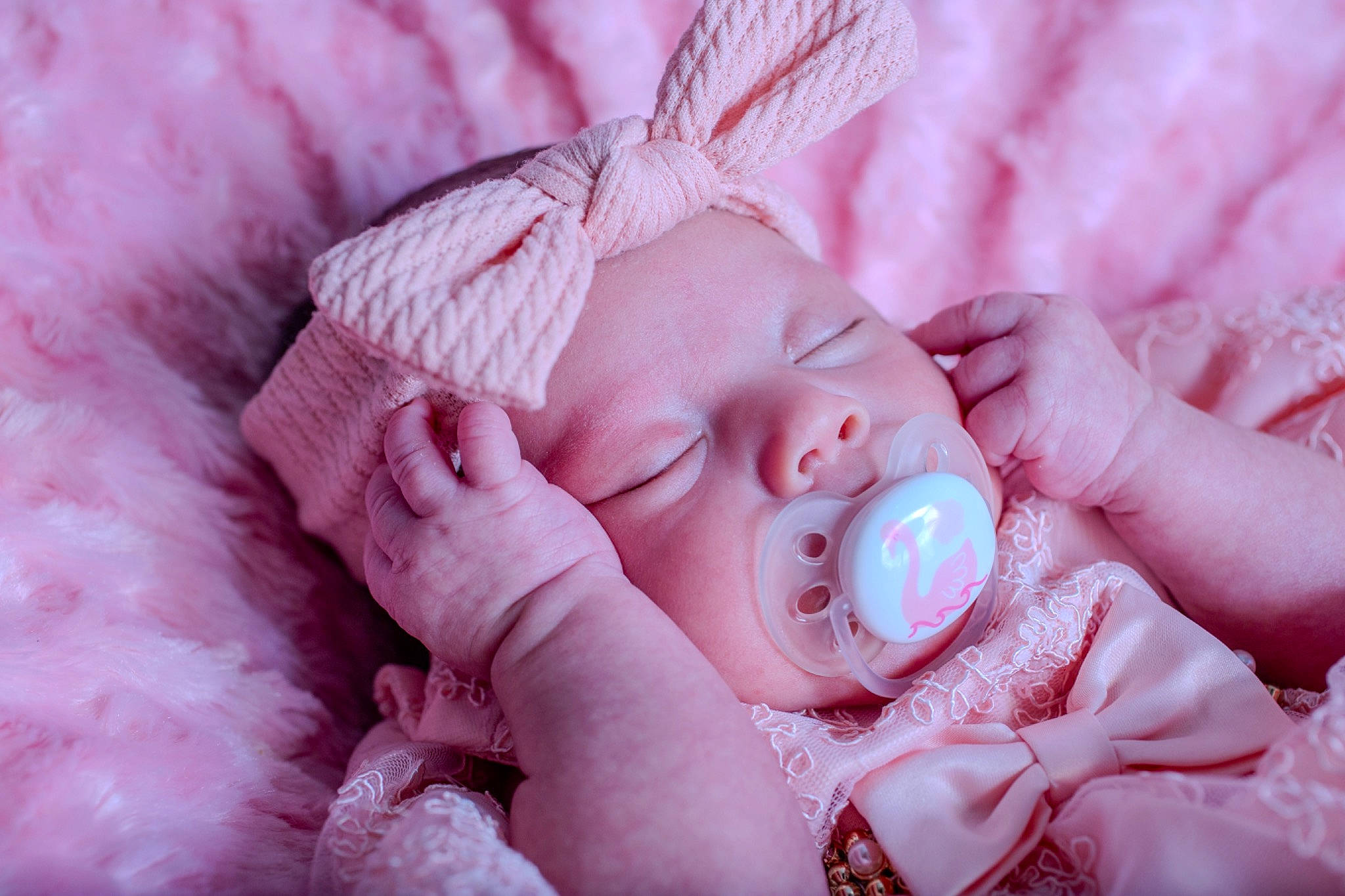 Kehlani joined the competition — help win amazing prizes! baby, baby_sleeping, baby_toddler_clothing, child, close_up, comfort, eyelash, fashion_accessory, gesture, hand, happy, linens, lip, magenta, nail, peach, person, pink, skin, thumb