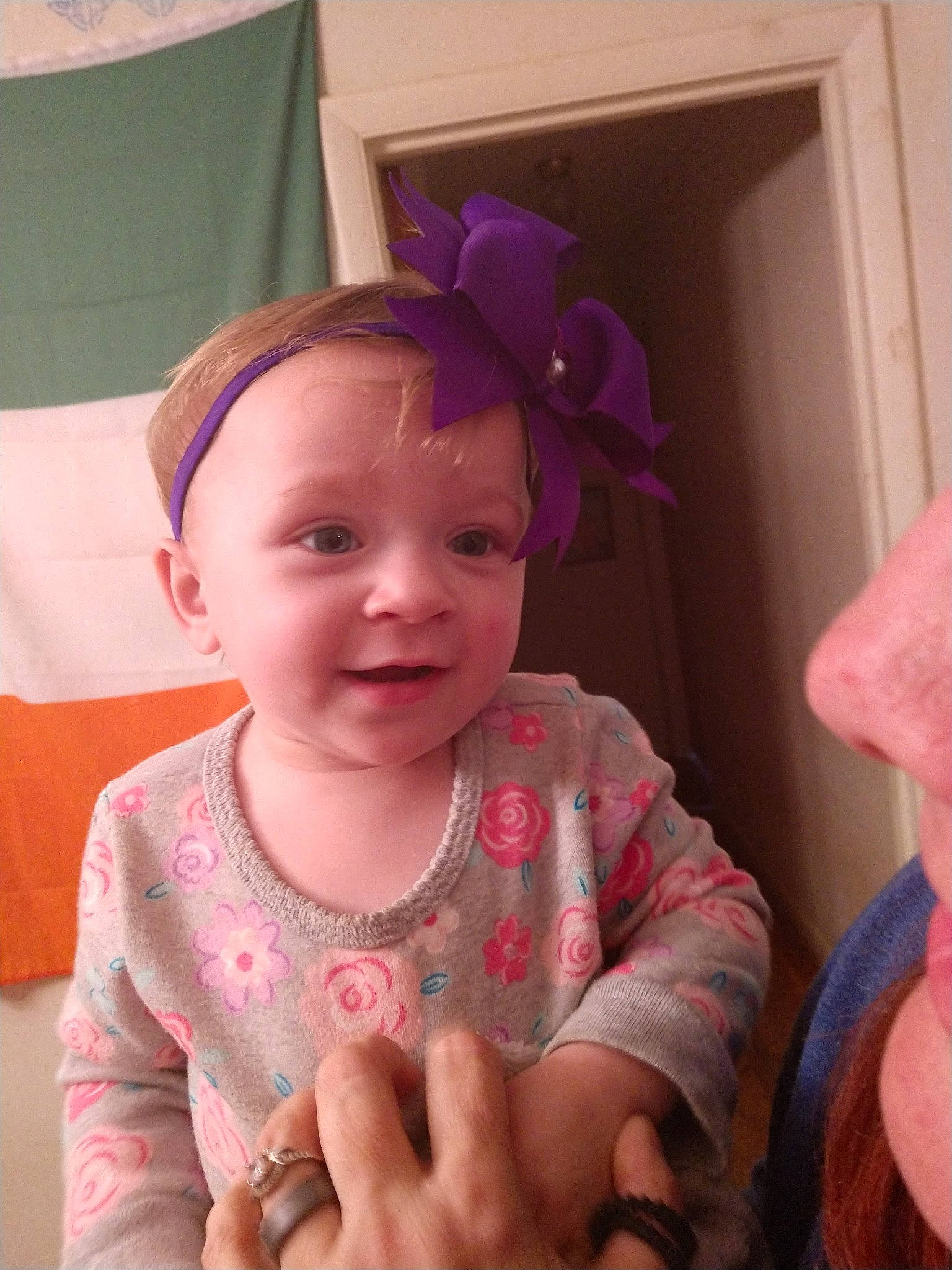 Arylynn joined the competition — help win amazing prizes! baby, cheek, child, ear, face, fashion_accessory, finger, hair_accessory, head, headband, headgear, person, pink, skin, smile, toddler